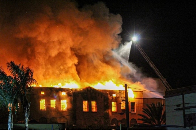 On Sunday, November 27th, 2022 at approximately 12:40am, units from the Ventura County Fire Department initially responded to a reported structure fire at the Santa Paula High School gymnasium. When units arrived on scene, flames were already visible through the roof of the building. Units on scene quickly upgraded the incident to a second alarm structure fire and went into defensive mode. Additional units from Fillmore Fire Department (Engine 91), Oxnard Fire Department, and Ventura City Fire Department responded to the scene where the fire was fought overnight. This incident was named the “Paula Incident”. No injuries were reported and the cause of the fire is unknown. Investigators from the Ventura County Fire Department and Santa Paula Police Department will be investigating the scene to determine the cause of the incident. Photo & Caption Courtesy:
@805FireMedia, located on Instagram.