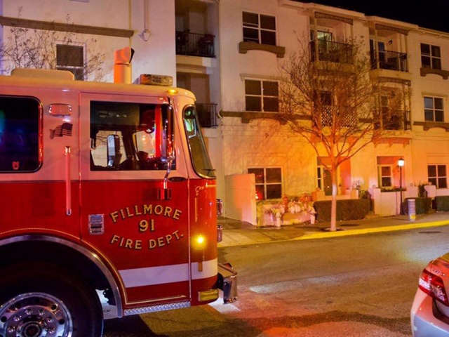 On Saturday, January 15th, 2022, at 3:45am, Fillmore Fire Department, Ventura County Fire, and AMR paramedics were dispatched to a reported structure fire at the Park View Apartments, 500 block Main Street. Arriving Fire crews found an unknown type of fire in apartments 209 and 219 that were extinguished before crews arrived on scene. AMR paramedics treated a female patient for unknown injuries; Red Cross, and fire investigators were also dispatched to the scene. No additional information was provided. Photos courtesy Angel Esquivel—AE News.
