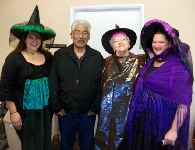 The witches are Amanda Parker, Raelene Chaney, and Leona Palmateer. These witches all volunteer at the Lemon Way Store Front Brown Bag. Mr.s Chaney is the