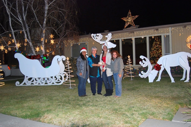 Congratulations to the Carpenters at 626 Shiells Drive, where you will find beautifully wood handcrafted reindeers, sleigh and more! Grandma has imparted to her two granddaughters, Sierra and Bailey Huerta, the art of woodworking and holiday decorating! Mrs. Carpenter was awarded $30 gift certificate from Otto & Sons who so generously donates to this wonderful organization. What Christmas cheer this home brings to our community and we thank our community who participates every year…It just seems to get better and better! Fillmore Vision 2020 Civic Pride would also, like to make known honorable mentions: 420 Clay St., 812 Woodgrove, there are so many more in our wonderful community to take the family out for a drive to view!