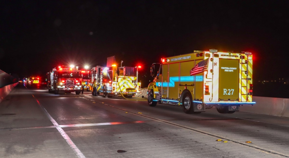 On Sunday, June 25, 2023, at 8:81pm, Fillmore City Fire Department and Ventura County Fire Department were dispatched to a reported brushfire under the A Street bridge / Chambersburg Road, just north of Fillmore city limits. Arriving firefighters found a fire burning underneath the bridge, and a 35-foot ladder was lowered to make access. They reported that a homeless encampment was burning an area of about 50 feet by 50 feet. Firefighters launched their attack plan and requested Fillmore Patrol Services for a hard road closure of the bridge. As of 9:30pm, the fire was reported out and road closures were lifted before 9:40pm. Photo credit Angel Esquivel-AE News.