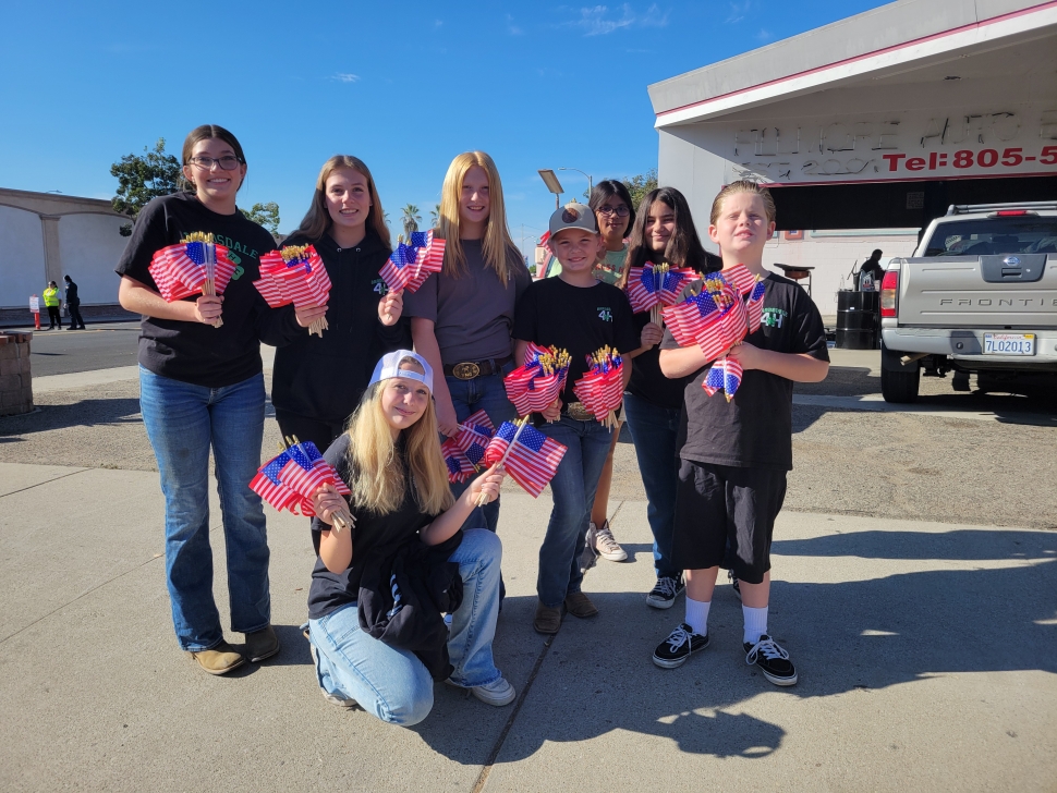 Bardsdale 4-H members passed out flags to the community before the Veterans Day Parade on Monday, November 11th. “They loved seeing the smiles of our community,” said proud mom Christine Bingham. Pictured are Gabby Bingham, Mia Bingham, Payton, and John Anderson, Alani Mckeen, Savanah Gray, and Mari Morales. Photo credit Gazette staff.