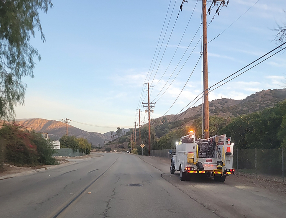 On Wednesday, January 8, at 7am, SoCal Edison crews were spotted along A Street in North Fillmore checking on power lines after the power was shut off as a precaution during high fire warnings. The power was terminated at 2am. Traffic signals were also impacted by the power cut. Photo credit Gazette Staff. 