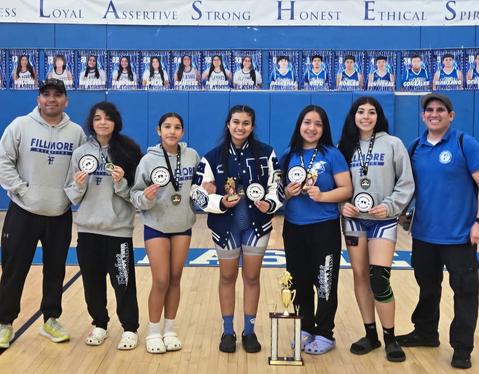 On Saturday, February 8, Fillmore Flashes Wrestling hosted the Citrus Coast League (CCL) Wrestling Finals. Fillmore Boys and Girls Wrestling teams comped in the finals, with the Boys placing 3rd overall, and Girls placing 2nd overall. The team qualified 16 students to advance to the CIF Northern Division Individual Championships. The girls will compete at Adelanto High School and the boys at Mira Costa High School on Friday and Saturday, February 14 and 15. Pictured (l-r) are Coach Ignacio Juarez, with CCL Champions Olivia Juarez, Naomi Bonilla, Emma Torres, Alexa Martinez, Skyla Sandoval, and Coach Mike Torres. Photo credit Daniel Cruz and Jimmy Torres Jr. More photos online at www.FillmoreGazette.com.