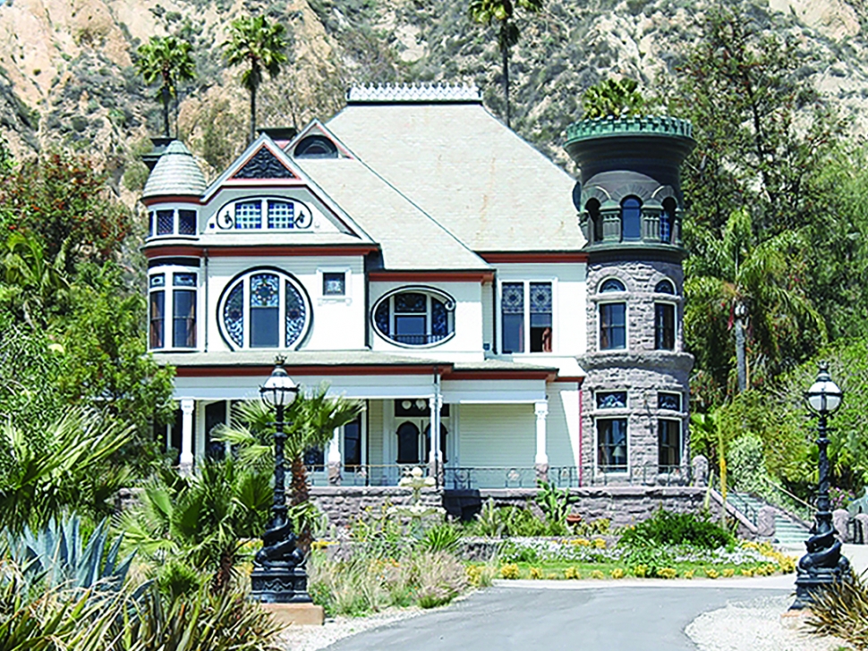 The Piru-Newhall Mansion, also known as the (David C.) Cook Mansion, is officially on the market for $7.5 Million. Cook’s house became known as the Piru Mansion because of Sunkist’s “Mansion Brand” Valencia oranges, which can still be found in the area. The mansion originally used natural gas as it possessed no electricity or running water. The 14,000-acre estate was purchased by a Christian publisher in 1890. In 1983 it was rebuilt by Santa Clara Valley’s Newhall Family (1968), after it burned down. They owned and lived in it until 1992. In 1994, the Northridge earthquake also knocked down two chimneys. In 2003, the Newhall’s sold the Piru Mansion to David Newhall Hill, a relative of the Newhall family. In 2012, the Mansion was sold to a private investment group and converted into an event venue for weddings, corporate retreats and other occasions as well as a private vacation rental for overnight accommodations.