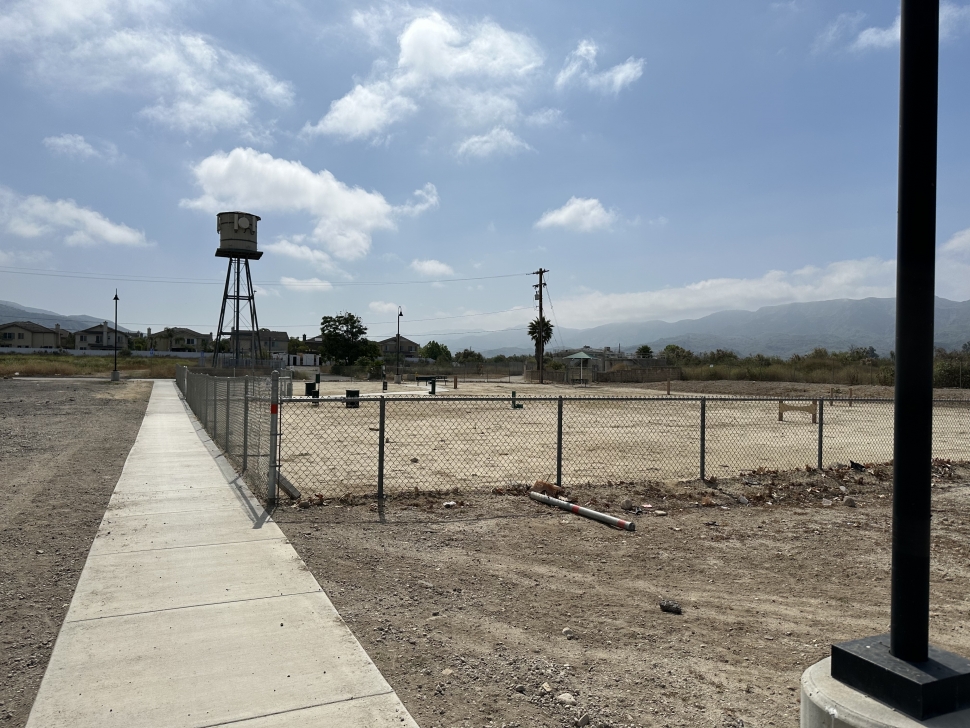 Repair and improvements have begun at the dog park (at Two Rivers Park), which closed over three years ago after violations of the Americans with Disabilities Act (ADA) were reported, a fact pointed out to the city by a Fillmore resident who uses a wheelchair. Pictured are a concrete sidewalk connecting C Street to the park playground, and handicap parking on, also on C Street. In 2020 the cost to make the necessary corrections (dog park) would have been $52,000, which the City of Fillmore decided not to do. The corrections called for the city to redesign, relocate and enlarge the gates and provide an accessible route to the benches. ADA corrections were also needed regarding the parking lot, play spaces, skate park, and athletic field seating. The City Council voted in 2020 to pay approximately $200,000 for the violations in the other areas, along with the dog park.