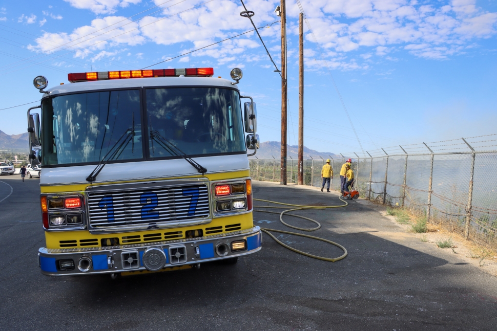 On Monday, September 9, at 9:04 a.m., Ventura County Fire Department and Fillmore City Fire responded to a small brush fire near Lookout Point and Goodenough Road. Arriving firefighters reported a 50x50’ brush fire on the hillside that was knocked out in minutes. The chain-link fence that separates the lookout parking lot from the hillside was cut by firefighters for access to the fire. A Ventura County Fire Investigator was called to the scene, and the incident was being investigated for possible arson. No further information was provided. Photo credit Angel Esquivel.