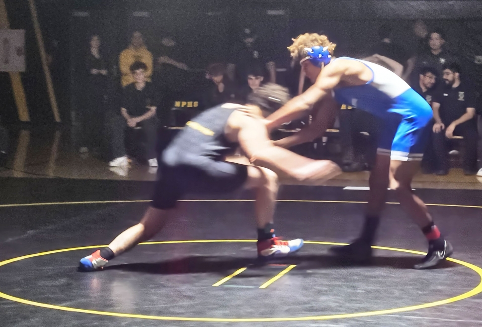 On Thursday, December 5, 2024, Fillmore Flashes Boys and Girls Wrestling took on Newbury Park High. Pictured is Flashes Elijah Hodges during his match as he tries to get the upper hand on his opponent. Photo credit Daniel Cruz.