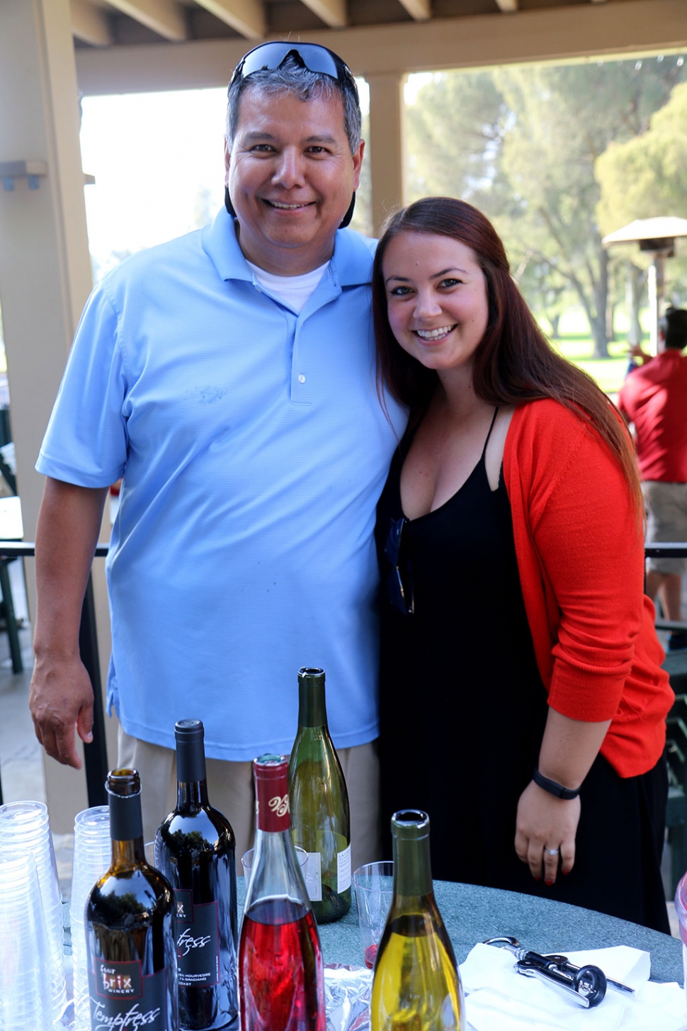 Fillmore Fire Chief Rigo Landeros is picutred with a tournament attendee.