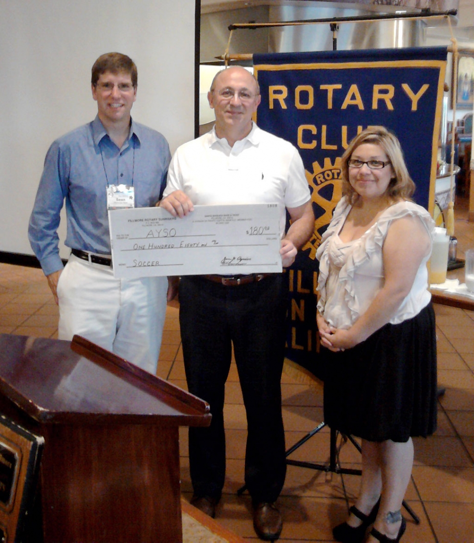 (l-r) Sean Morris, incoming Club president Pierre Gerardy of AYSO, and Irma Magana-Rodriguez, Club president