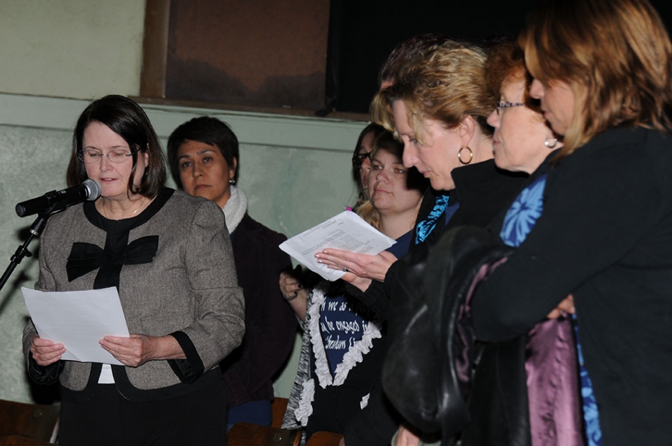 Karen Ashim reads her statement.