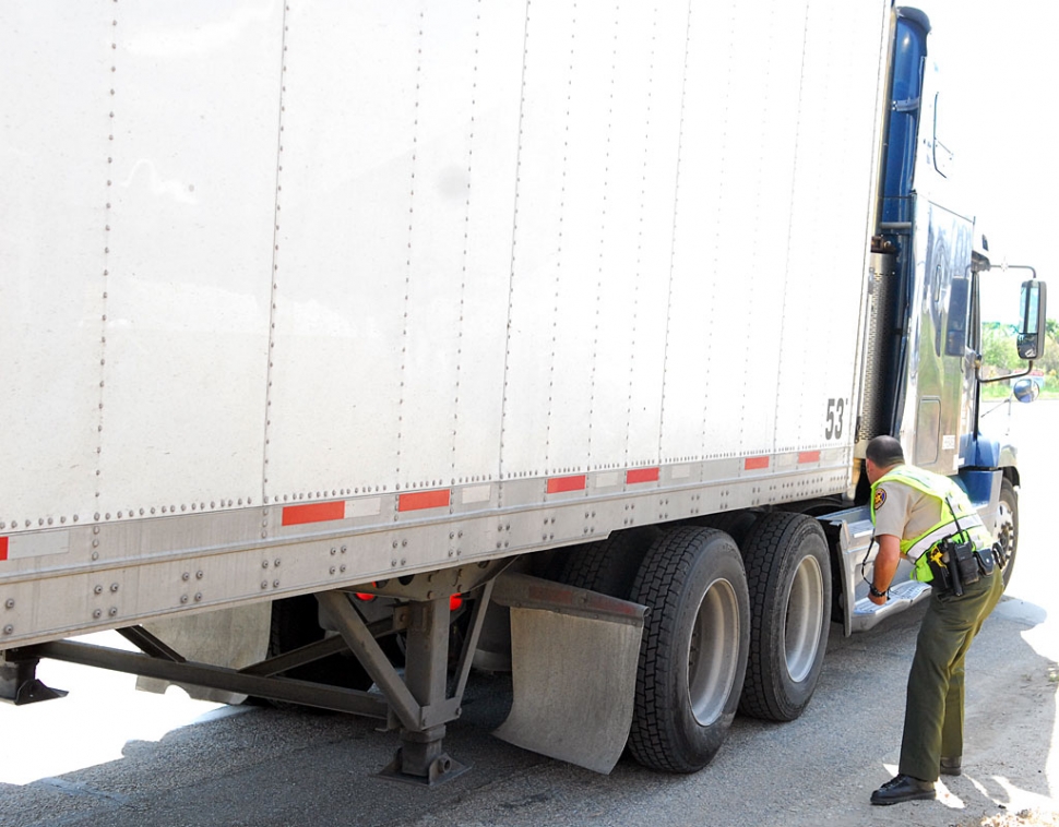 It is believed that the car struck tires on the big rig. Injuries were undetermined at press time.